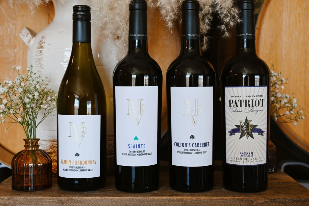 McGrail Vineyards wine bottles displayed for a home wine tasting setup.