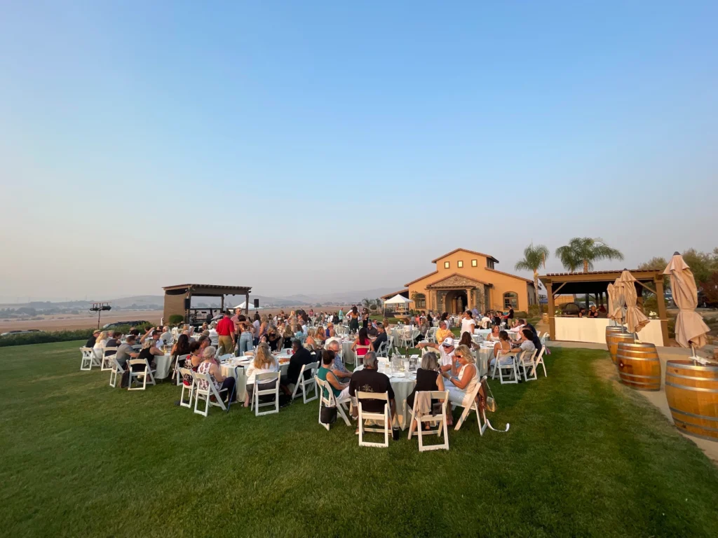 McGrail Vineyards Cattle Cabernet Country event with guests dining among Livermore Valley vineyard views.